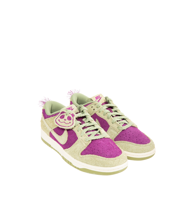 Image 2 of 5 - PURPLE - NIKE Dunk Low Retro SE Sneaker featuring iconic Panda colorblocking in a hairy suede iteration, paired with plush padding, foam midsole offers lightweight, responsive cushioning, rubber outsole with classic pivot circle, low-cut collar and hairy Panda tag. 