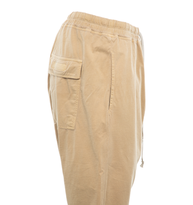 Image 3 of 5 - YELLOW - DRKSHDW Drawstring Shorts featuring mid-rise, elasticated drawstring waistband, concealed front button fastening, drop crotch, two side slit pockets, two rear flap pockets, straight leg, raw-cut hem and below-knee length. 100% cotton. 