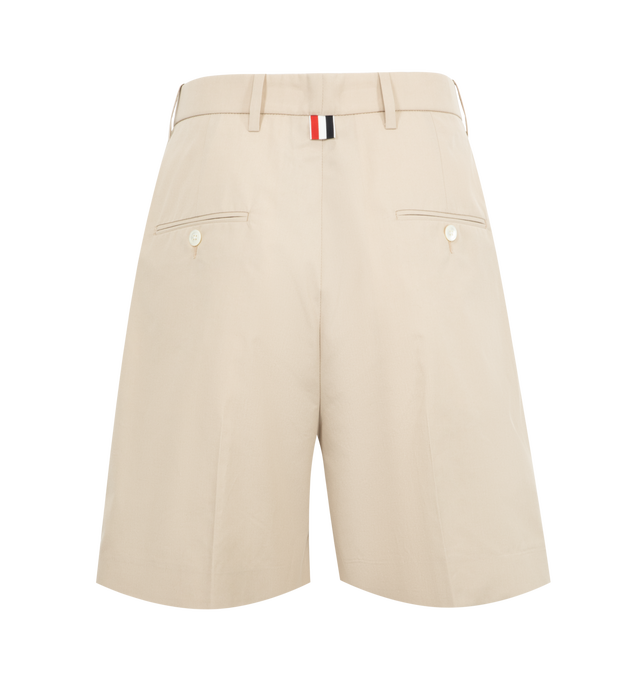 Image 2 of 3 - NEUTRAL - THOM BROWNE Typewriter Cloth DOuble Pleat Shorts featuring tab front closure, high waist, button-fastening back welt pockets and signature striped grosgrain loop tab. 65% polyester, 35% cotton. Made in Italy. 