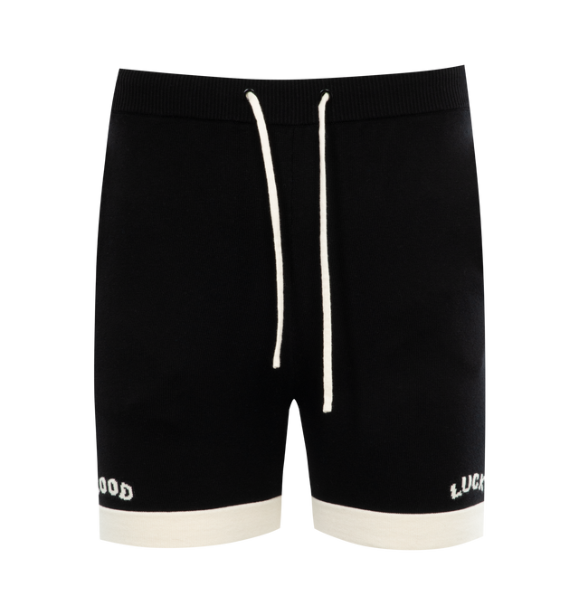 Image 1 of 3 - BLACK - MR. SATURDAY Good Luck Knit Polo Short featuring standard fit, seam pockets, drawstring closure, contrast paneling and graphic on thighs. 93% cotton, 7% cashmere. 