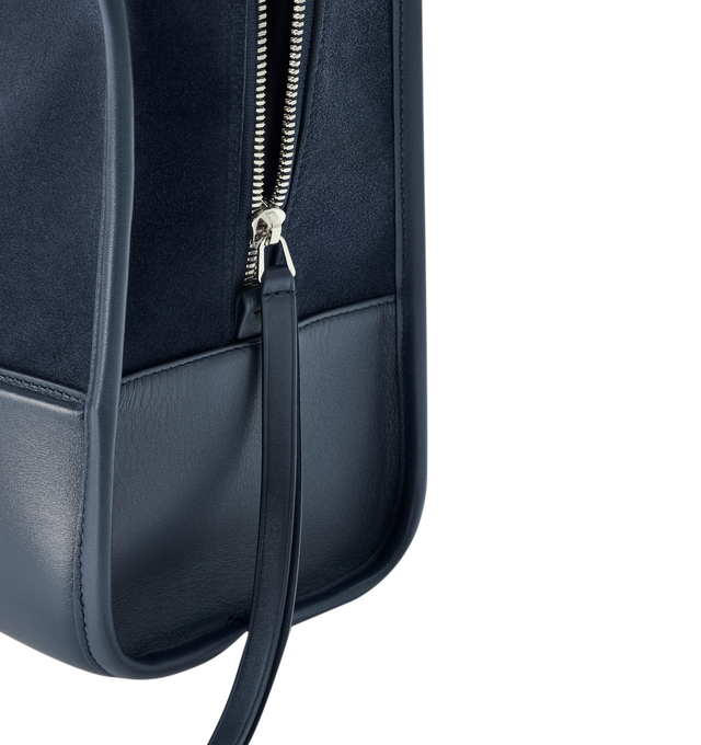 Image 13 of 16 - NAVY - Loewe Large Amazona 180 Bag in suede featuring a relaxed silhouette anchored by a single toron top handle, designed to be carried open while a concealed closure secures the main compartment, removable shoulder and crossbody straps, zip closure with two leather zip pullers, two compartments, main compartment closed with magnetic closure, internal flat pocket, left side d-ring for customization, suede and nappa lambskin lining, embossed LOEWE and embossed double L branding. Suede/calf. 