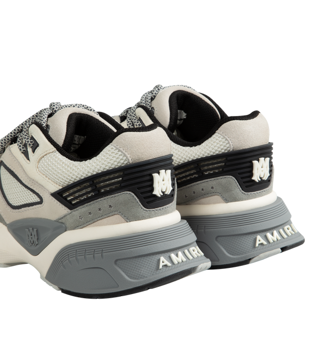 Image 3 of 5 - GREY - AMIRI MA Runner Sneakers featuring breathable mesh fabric with leather overlays, flat heel, branded reinforced round toe, lace-up vamp, tubular laces, raised MA logo on the tongue, backstay, and side, padded tongue and collar, raised logo on the heel and rubber outsole. 