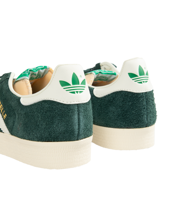 Image 3 of 5 - GREEN - Adidas Classic Suede Gazelle Sneakers are a lace-up style with satin uppers, suede and synthetic overlays, and gum outsoles. Textile linings.  