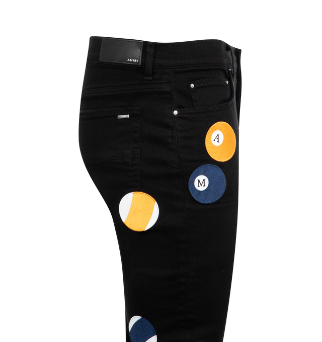 Image 3 of 3 - BLACK - Amiri Pool Ball Skinny Jeans are a 5-pocket style with pool ball appliques. Made in USA.  