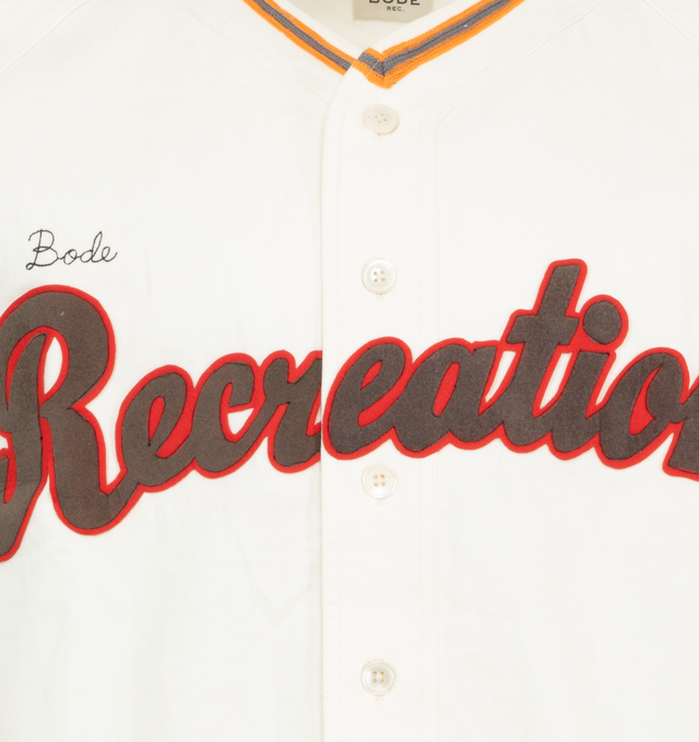 Image 3 of 3 - WHITE - Bode Baseball Shirt is a jersey style with a front button closure,  short sleeves, a patch graphic and an embroidered logo. 100% cotton. Made in India. 