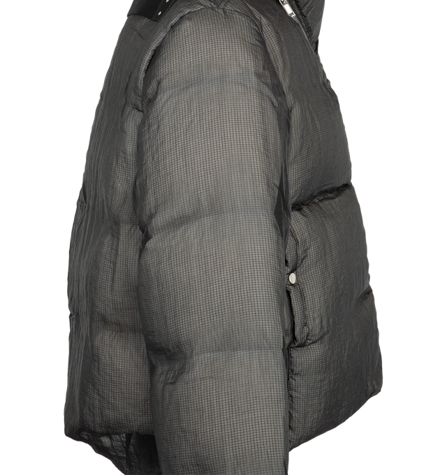 Image 3 of 3 - BLACK - Rick Owens Men's Turtle Jacket is crafted from polyamide and features a puffer padded design with a stand collar and long sleeves. Designed with zippered side pockets, ribbed cuffs, a straight hem, and a tonal strap detail at the back. Main Material: Polyamide.  