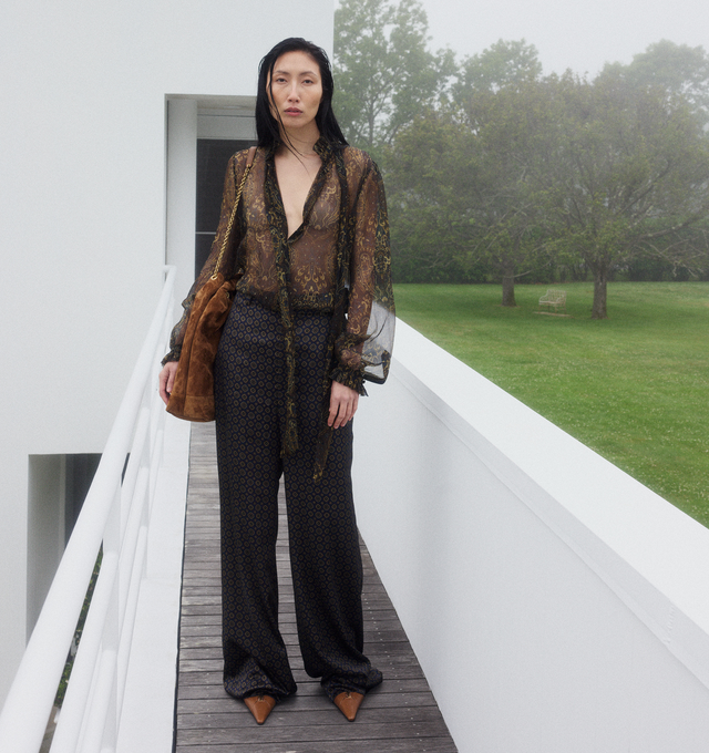 Image 3 of 4 - BROWN - SAINT LAURENT Printed Blouse featuring hidden front button closure, tie-up detail at collar, buttoned cuffs, sheer chiffon fabric and print throughout. 100% silk. Made Italy. 