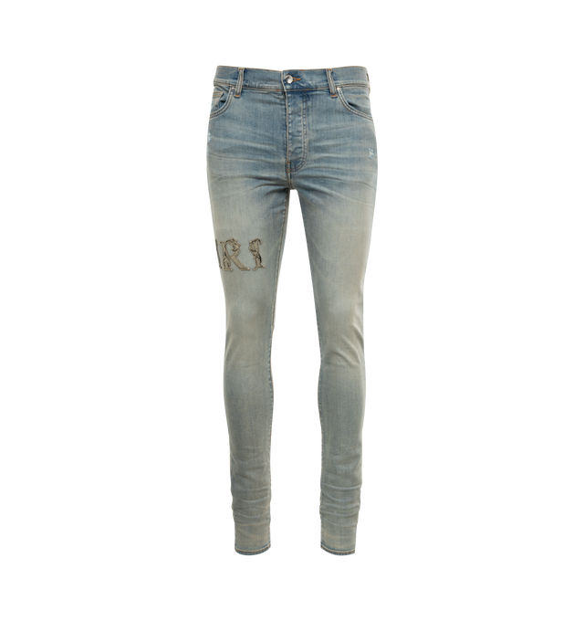BLUE - AMIRI Baroque Logo Jeans featuring faded denim, belt loops, regular rise, five-pocket style, embroidered logo lettering at right thigh, full length and slim fit. Cotton/elastane. Made in USA.