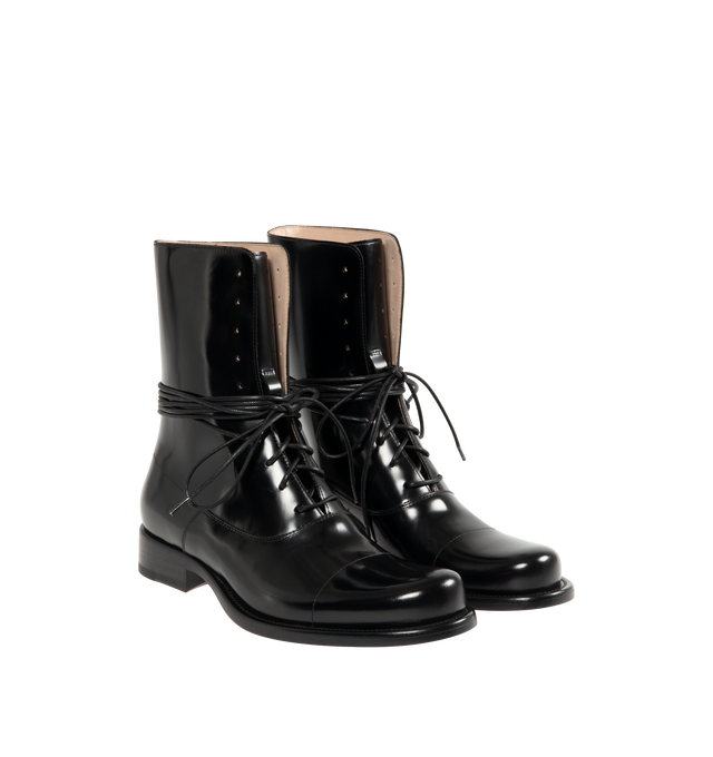 Image 2 of 4 - BLACK - THE ROW Kai Lace Up Boot featuring lace-up ankle boot in glossy calfskin leather with elongated round toe, extended leather sole and stacked leather heel. 100% calfskin leather. Leather sole. Made in Italy. 