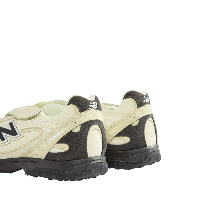 Image 3 of 5 - YELLOW - New Balance Unisex 204V Sneakers are crafted from premium suede and textile materials. The design features a multi-piece upper with embossed overlays, screen-printed saddle graphics, and a molded 'N' logo. Upper: Premium Suede and Textile. Sole: Rubber. *Unisex style in men's sizing. 
