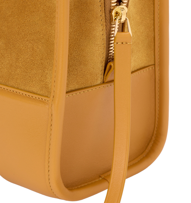 Image 14 of 16 - YELLOW - Loewe Women's Amazona 180 Medium Bag is crafted from suede and calf leather and features a relaxed silhouette with a single toron top handle, a concealed magnetic closure, and removable shoulder and crossbody straps. Designed with two compartments, an internal flat pocket, and a side D-ring for personalization, this versatile style can be carried by hand, over the shoulder, or crossbody. Suede lining and embossed LOEWE branding complete the design. Main Material: Suede/Calf Leather 