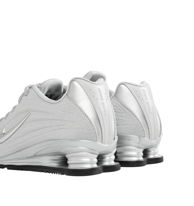 Image 3 of 5 - SILVER - NIKE Shox Z Sneaker featuring a slim, low-profile shape, textile upper, synthetic leather accents, Nike Shox columns, circular Waffle outsole, foam midsole and rubber outsole. 