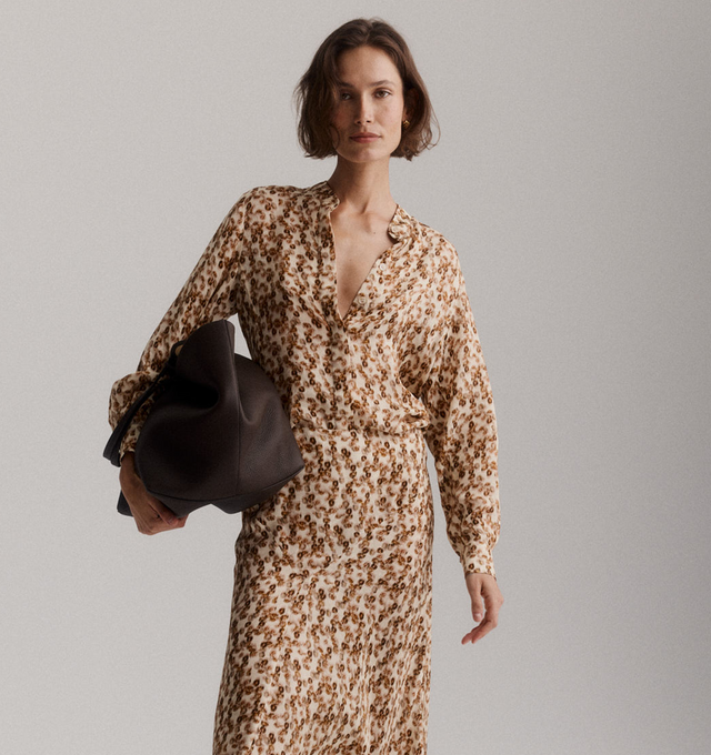 Image 2 of 4 - ORANGE - ISABEL MARANT Ilda Shirt featuring silk blend shirt with python print, stand-up collar, hidden buttons, shoulder yokes, long sleeves, straight buttoned cuffs, rounded hem and flowing cut. 91% silk, 9% elastane. 