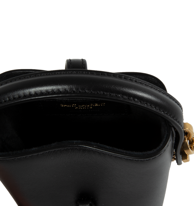 Image 3 of 3 - BLACK - SAINT LAURENT Le 37 Micro Bucket Bag featuring metal cassandre hook closure, leather top handle and detachable chain strap. 4.3" X 5.3" X 2". 100% calfskin leather. 