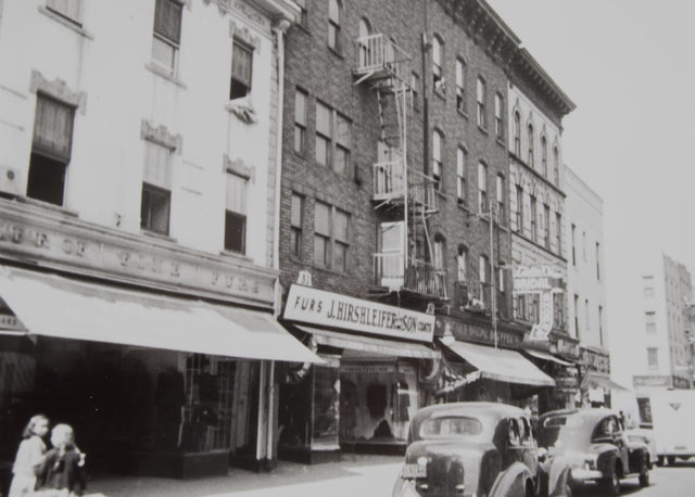 Black and white photograph of J. Hirshelifer & Sons Furs storefront in New York City
