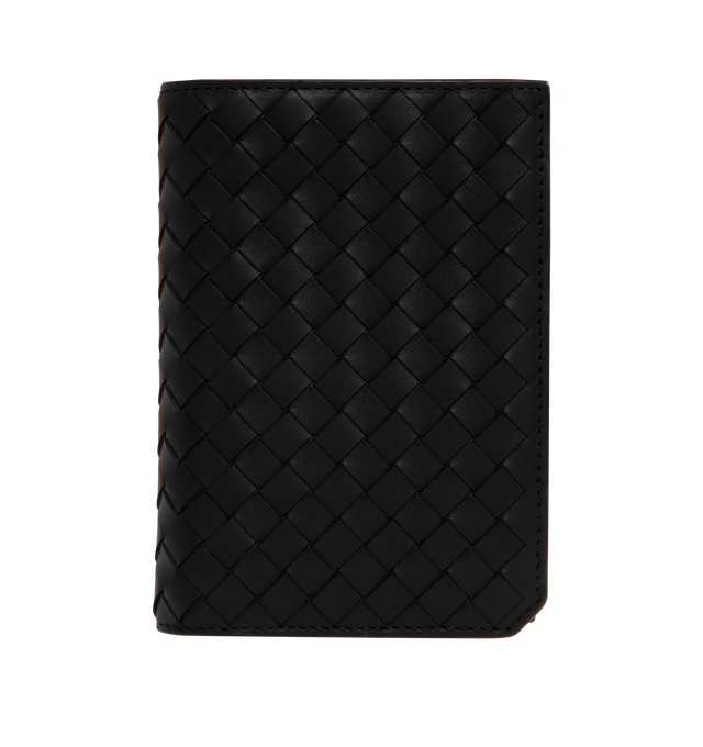 Image 1 of 3 - BLACK - Bottega Veneta Intrecciato Passport Holder has 5-card slots, 2 patch pockets, and a woven exterior design. 100% calfskin leather. H 5.25 X W 3.75 inches. Made in Italy. 