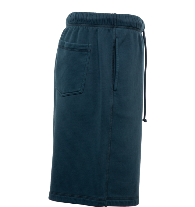 Image 3 of 4 - BLUE - THE ROW Stanton Shorts featuring oversized knee-length short in heavy French terry with drawstring elastic waistband, side seam pockets, and rear patch pocket. 93% cotton, 7% polyamide. Made in Italy. 