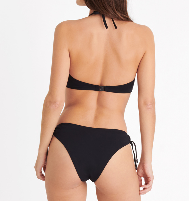 Image 4 of 5 - BLACK - ERES Never Thin Bikini Briefs featuring adjustable spaghetti straps connected by a round link on each side with branded tips, side shirring and indented in the front and back. 84% Polyamid, 16% Spandex. Made in Morocco.  