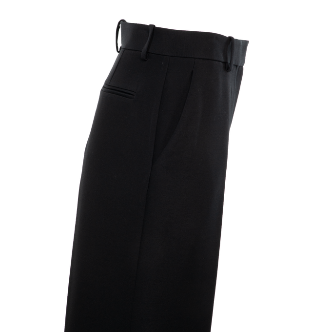Image 3 of 4 - BLACK - KHAITE Bacall Pant featuring low waist, long-rise, tailored in softly structured suiting and added room in the leg for a more relaxed fit. 75% viscose, 25% polyamide. 