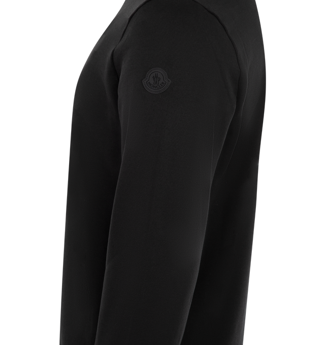 Image 3 of 3 - BLACK - Moncler Embroidered Logo Sweatshirt has a crew neck, an embossed silicone logo patch, and an embroidered logo on the chest. 100% cotton. Made in Turkey.  