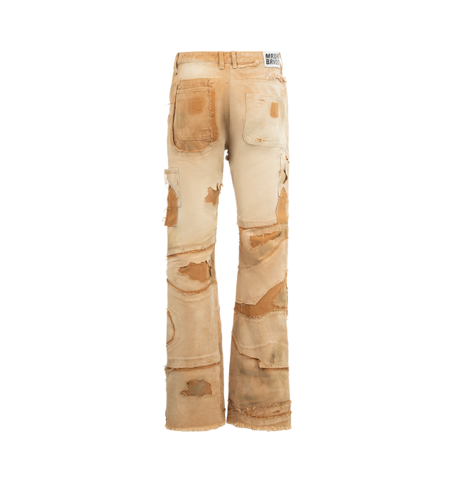Image 2 of 3 - BROWN - WHO DECIDES WAR Unearthed Distressed Trousers featuring a mid-rise, straight-leg silhouette, extreme distressing, signature cathedral-inspired patches, five-pocket style, zip fly and button closure. 100% cotton.  