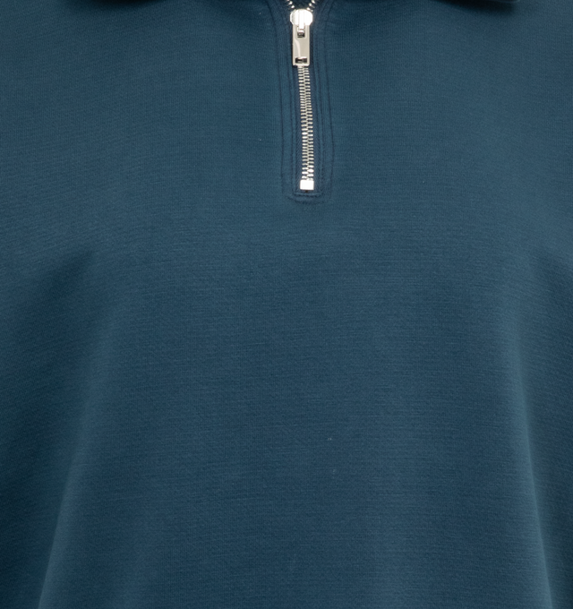 Image 3 of 3 - BLUE - THE ROW Stanfield Top featuring quarter-zip sweatshirt in heavy French terry with relaxed fit, standing collar, and ribbed cuffs and hem. 93% cotton, 7% polyamide. Made in Italy. 