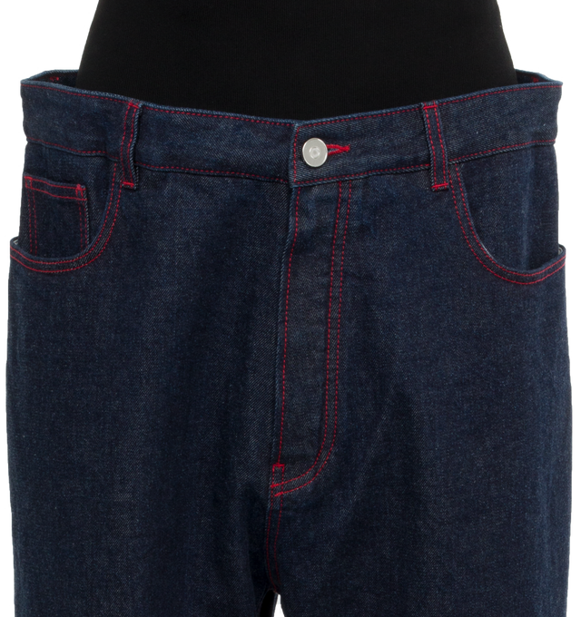 Image 4 of 4 - BLUE - ALAIA Knit Band Jeans featuring brut denim with knitted band, high waisted black figure hugging knitted belt, loose and straight fit, 4 pockets, Alaa dart details at the back and red contrasting upstitching. 99% cotton, 1% polyurethane. Made in Italy. 