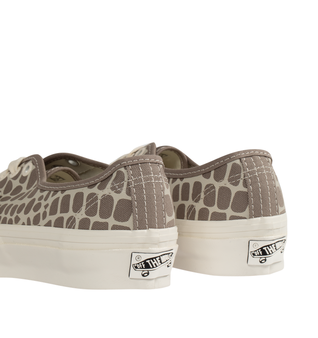 Image 3 of 5 - BROWN - VANS Authentic Reissue 44 LX Sneakers featuring low-top, lightweight canvas upper,  lace-up closure, logo flag at outer side, rubber logo patch at heel, textured rubber midsole, treaded rubber sole and contrast stitching in white. Upper: canvas. Sole: rubber.  