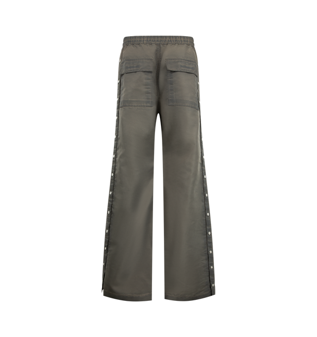 Image 2 of 3 - GREY - Rick Owens DRKSHDW Men's Wide Pusher Pants are crafted from washed bomber satin and feature a floor-length wide-leg silhouette with a slightly dropped crotch, an elasticized drawstring waistband, side pockets, flap back pockets, and snap closures along the outer legs that can be worn open or closed. Main Material: 100% Nylon.  