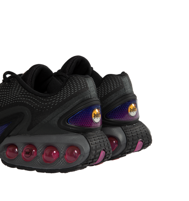 Image 3 of 5 - BLACK - NIKE AIR MAX DN features a Dynamic Air unit system of dual-pressure tubes, glossy accents, foam midsole and rubber outsole. 