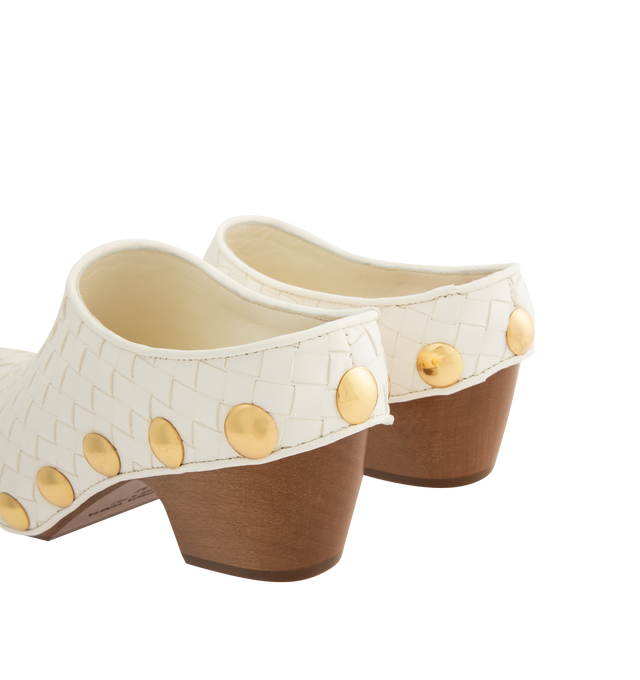 Image 3 of 4 - WHITE - BOTTEGA VENETA Gondola Clog featuring mule clog in shiny Intrecciato calf leather with metal stud detailing and a beech wood platform. Lambskin. Lining: calfskin. Made in Italy. 