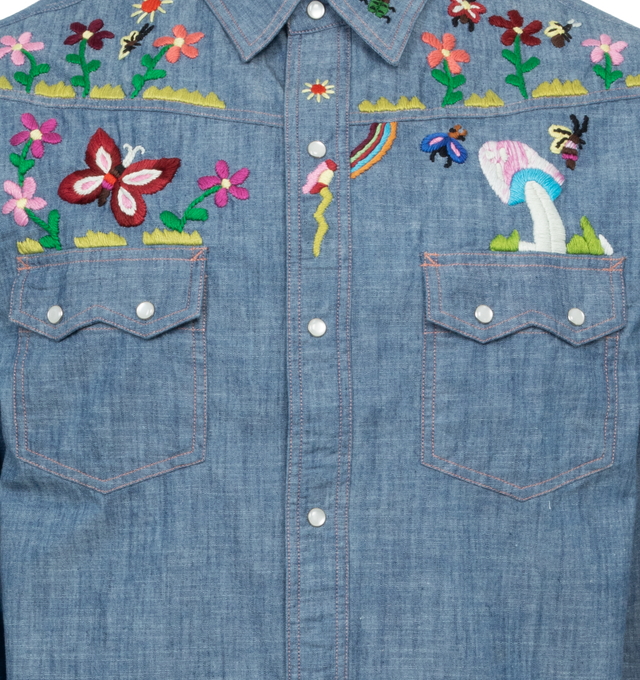 Image 3 of 4 - BLUE - NEEDLES Western Shirt featuring spread collar, press-stud closure, floral graphics embroidered at front and back, flap pockets, shirttail hem, adjustable two-button barrel cuffs and contrast stitching in pink. 100% cotton. Made in India. 