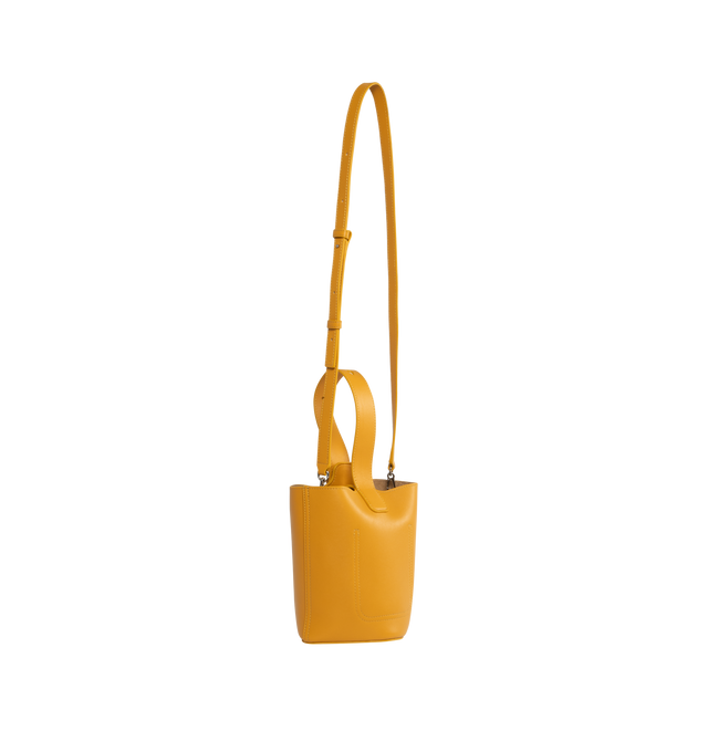 Image 2 of 3 - YELLOW - LOEWE Mini Pebble Bucket Bag featuring magnetic closure, internal pocket, bonded suede lining, anagram engraved Pebble, crossbody, shoulder or hand carry and adjustable and removable strap. 7.7 x 6.3 x 6.3 inches. Mellow Calf. Made in Spain.  