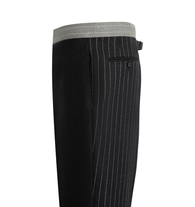 Image 3 of 3 - GREY - Thom Browne Men's Fit 1 Classic Trousers are crafted from wool flannel and feature a colorblocked spliced design with a contrast striped panel, an extended-tab waistband, and the brand's signature adjustable buttoned backstrap. Tailored in the label's Fit 1 silhouette, this style is finished with side on-seam pockets, back button-through welt pockets, rolled cuffs, and a zip fly with hook-and-bar closure. Main Material: 100% Wool. Lining: 100% Cupro. Made in Italy. 