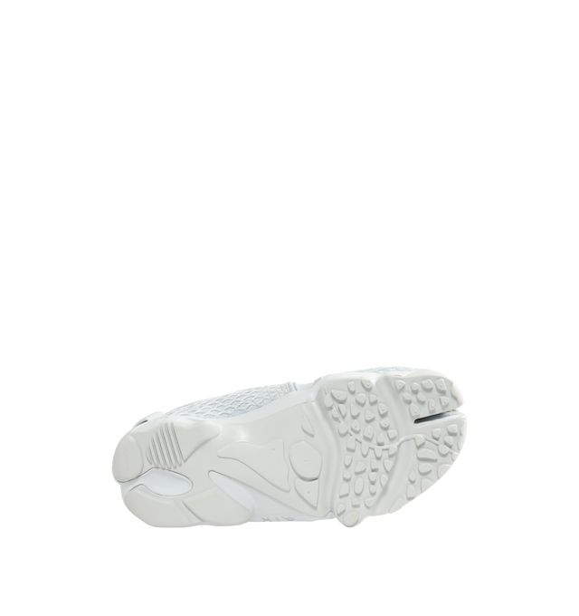 Image 4 of 5 - WHITE - Nike Women's Air Rift Sneaker featuring hook-and-loop straps on the midfoot and heel, Nike Air unit in the heel combined with plush foam, rubber detailing on the outsole, upper features a blend of elastane, polyester and nylon materials for a flexible fit and split toe design. 