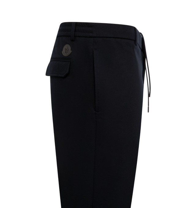 Image 3 of 3 - NAVY - MONCLER Tailored Trousers featuring cotton jersey technique, waistband with drawstring fastening, zipper and button closure, side and back pockets with snap button closure and leather logo patch. 90% cotton, 10% polyamide/nylon. 