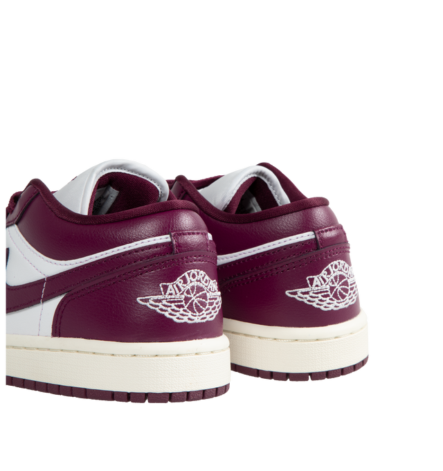 Image 3 of 5 - PURPLE - Air Jordan 1 Low Sneakers are a lace-up style with leather uppers, Air-Sole units for cushioning, and solid rubber outsoles.  