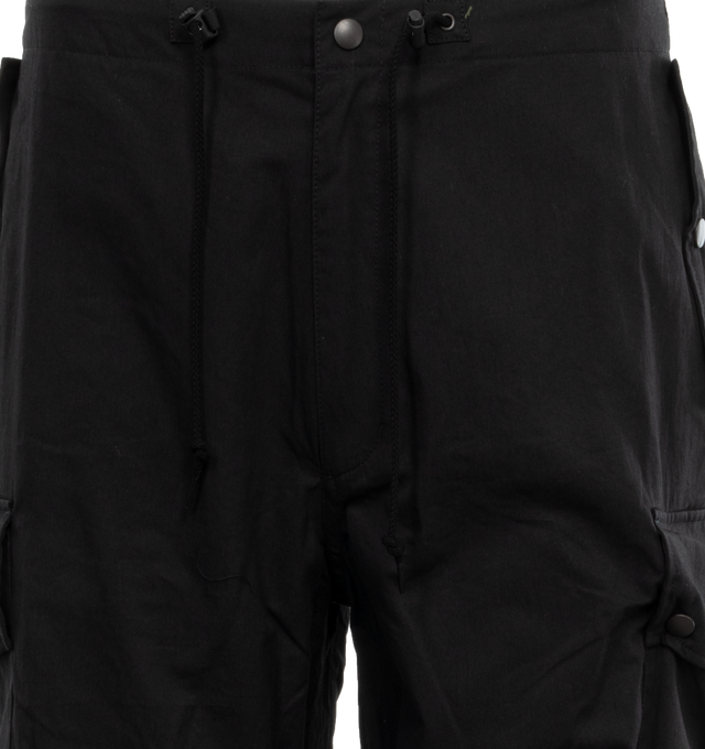 Image 4 of 4 - BLACK - NEEDLES Field Pants featuring drawcord waist and hem, flapped pockets, darting along the knee and five pockets. 100% cotton. Made in Japan. 