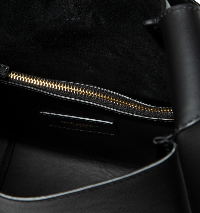 Image 3 of 3 - BLACK - SAINT LAURENT  Le A 7 Soft Small has a metal Cassandre hook closure, bronze-tone hardware, and interior zip pocket. Suede lining. 100% calfskin leather. Dimensions: 9 X 8.7 X 3.5 inches.  Made in Italy.  