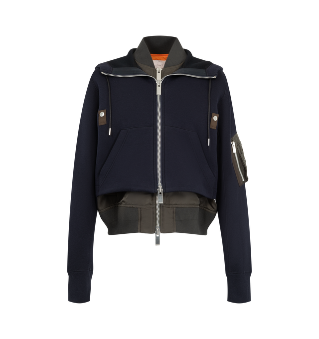 Image 1 of 4 - NAVY - Sacai sponge sweat hoodie with signature layered construction, double collar, zip-front closure, drawstring hood and rib-knit stand collar. Outer material is 62% cotton / 38% polyester with 100% nylon twill panels and 100% polyester lining and filling. 