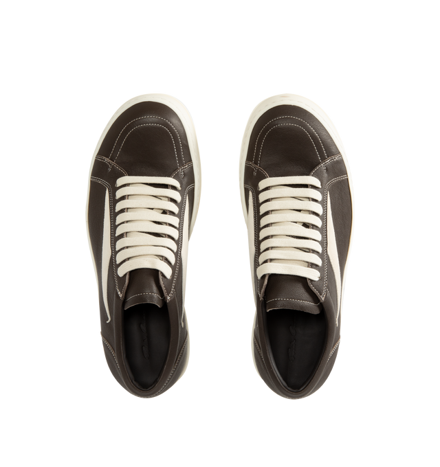 Image 5 of 5 - NEUTRAL - Rick Owens Men's Vintage Sneaks are crafted from full-grain cow leather and suede leather and feature an under-ankle silhouette with eight-eyelet lace-up fastening, toe caps, and signature shark-toothed bumper soles. Designed with a triangular leather appliqu at the side, a padded ankle, and contrast stitching that references the brand's iconic vintage-inspired sneaker aesthetic. Main Material: 100% Cow Leather. Lateral Details: 100% Calf Leather. Lining: 100% Calf Leather. Insole:  