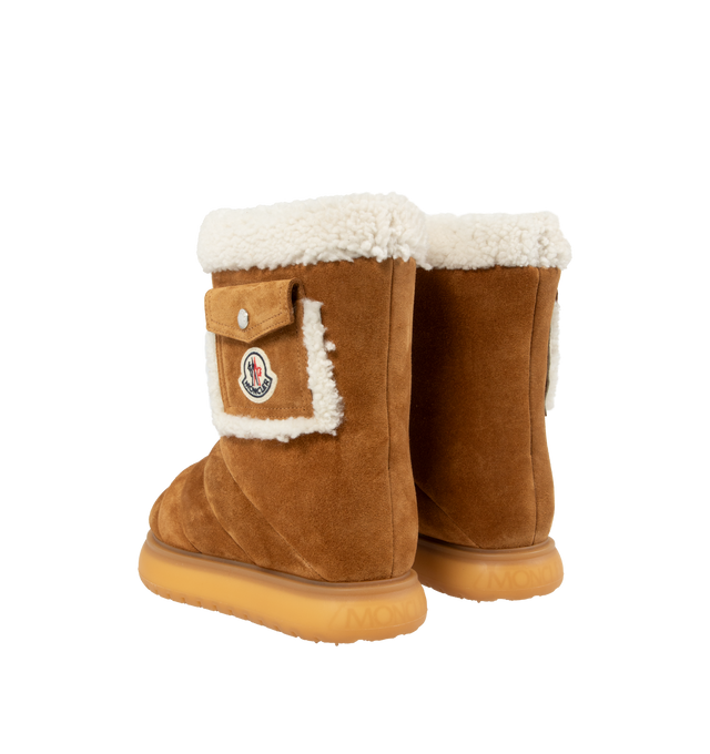 Image 3 of 4 - BROWN - MONCLER Gaia Pocket-Detailed Suede Ankle Boots featuring channel-quilted upper and plush faux-shearling lining, logo-patched shaft pocket, pull-on style, leather upper and rubber sole.  