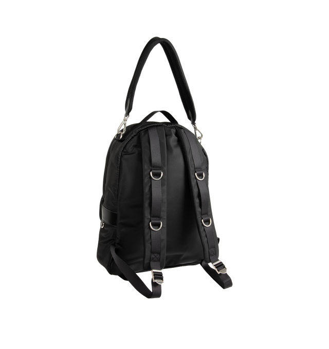 Image 2 of 3 - BLACK - Balenciaga Sleek Mens Nylon Backpack is crafted from black recycled nylon with smooth leather trim and features a zip-around closure and adjustable padded shoulder straps with metal hardware. A circular top handle, front logo print, metal logo plaque, interior pocket, and front compartment with two zippers complete the design. Fits a tablet, notebook, wallet, phone, keys, and small water bottle. Main Material: 100% Recycled Nylon. Leather Detail: Smooth Leather. Dimensions: 30 x 14 x  