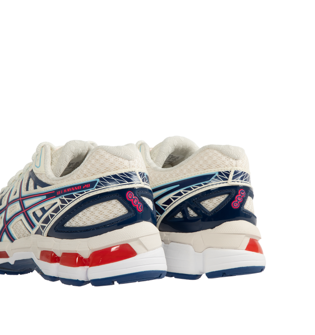 Image 3 of 5 - WHITE - ASICS GEL-Kayano 20 featuring FLUIDFIT technology cage, TRUSSTIC support system, dual GEL technology inserts, double-layer mesh construction, synthetic fiber outer, rubber sole, grid-like patterns, glossy finish, lace-up fastening, tongue pull loop and logo detail. Unisex style in men's sizing. 