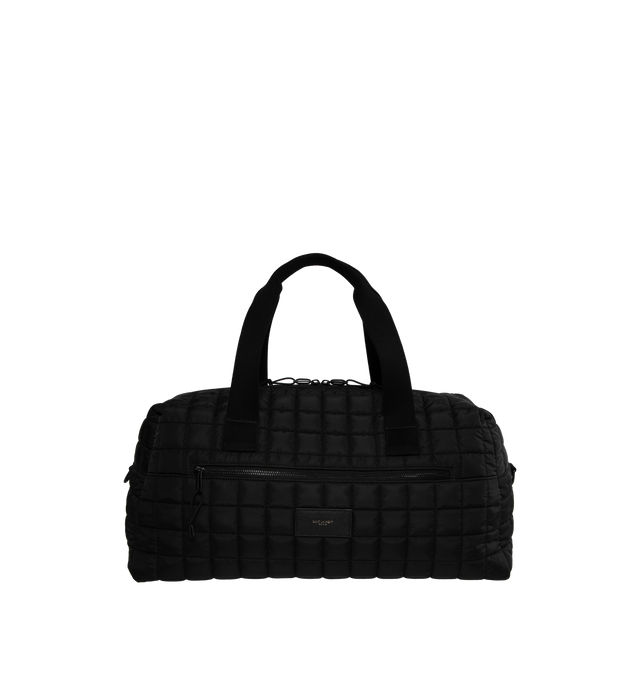 BLACK - SAINT LAURENT Nuxx Duffle Bag featuring quilted ECONYL�, two long top handles, an adjustable and removable shoulder strap with sliding pad, debossed signature on front, two way zipper closure, one exterior pocket and one zip pocket. 19.6 X 9.4 X 9.8 inches. 95% polyamide, 5% metal.