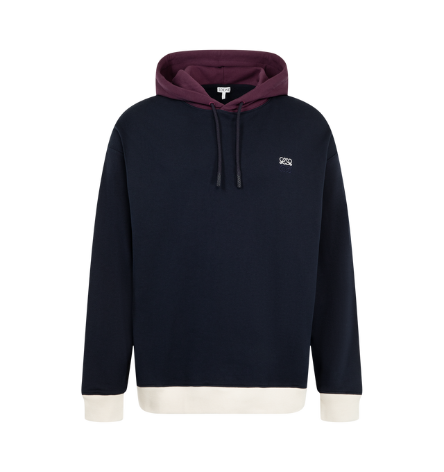 Image 1 of 2 - BLUE - Loewe Men's Hoodie in Cotton is crafted from medium-weight loopback cotton fleece and features a regular-fit silhouette with a contrasting hooded collar, hem, and ribbed cuffs. Designed with a leather braided drawstring detail and two-tone Anagram embroidery at the chest, showcasing the house's signature craftsmanship and elevated casual aesthetic. Main Material: 100% Cotton. Made in Portugal. 