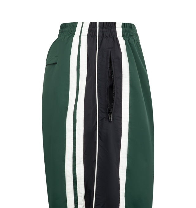 Image 3 of 3 - GREEN - VETEMENTS Tracksuit Pants featuring elasticized waistband, three-pocket styling and stripes at outseams. 100% polyester. Made in Italy. 