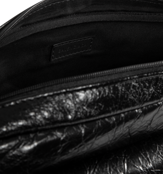 Image 3 of 3 - BLACK - BALENCIAGA Explorer Camera Bag featuring adjustable webbing strap, crossbody carry, Balenciaga logo debossed and printed at front, matte black hardware, zipped closure, front zipped pocket with flap, 1 main compartment, 1 inner flat pocket, BB logo engraved on zipper puller and cotton canvas lining. Lambskin, polyamide, polyester. 10" x 6.3" x 3.5". Made in Italy. 