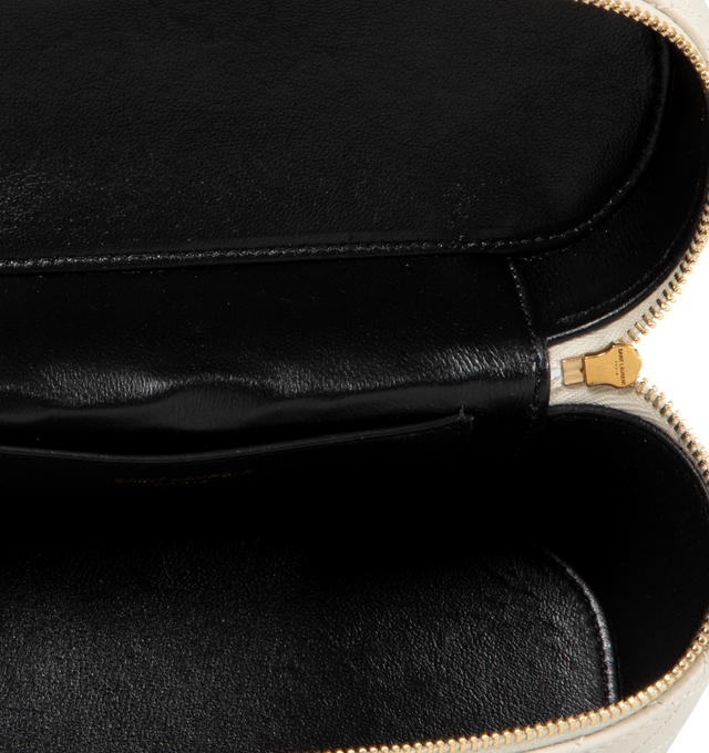 WHITE - SAINT LAURENT Gaby Mini Vanity Bag featuring zip closure, one card slot, diamond quilted overstitching, leather top handle and detachable strap. 7.1" X 4.3" X 2.6". 100% lambskin.  