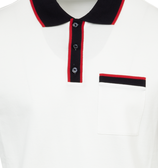 WHITE - MONCLER Polo Shirt featuring contrasting trim, chest pocket, polo collar, front button placket, short sleeves and straight hem. 100% cotton.